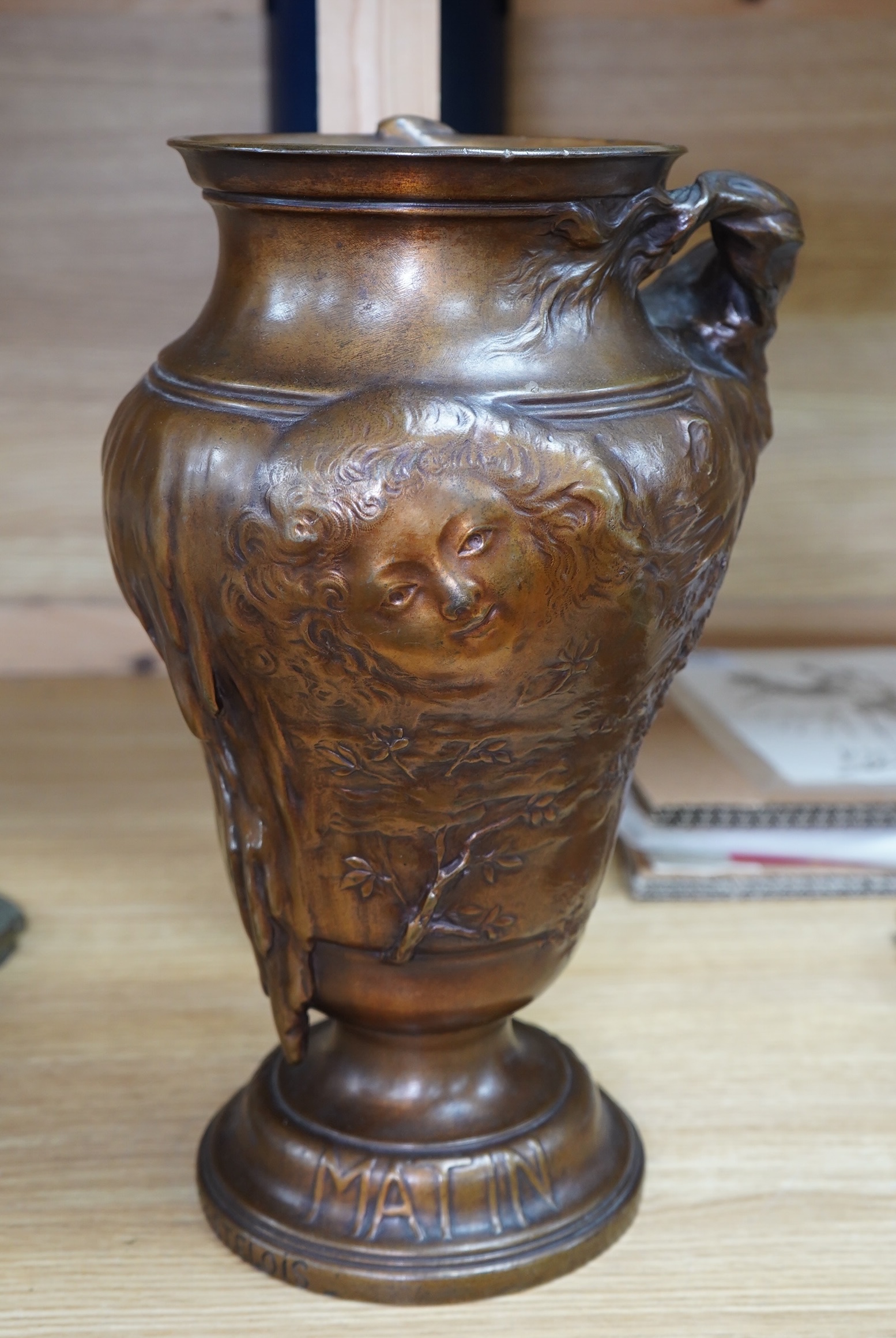 P. Legastelois. An Art Nouveau three sided figural bronze vase, MIDI, SOIR, MATIN written near base, 34cm high. Condition - good